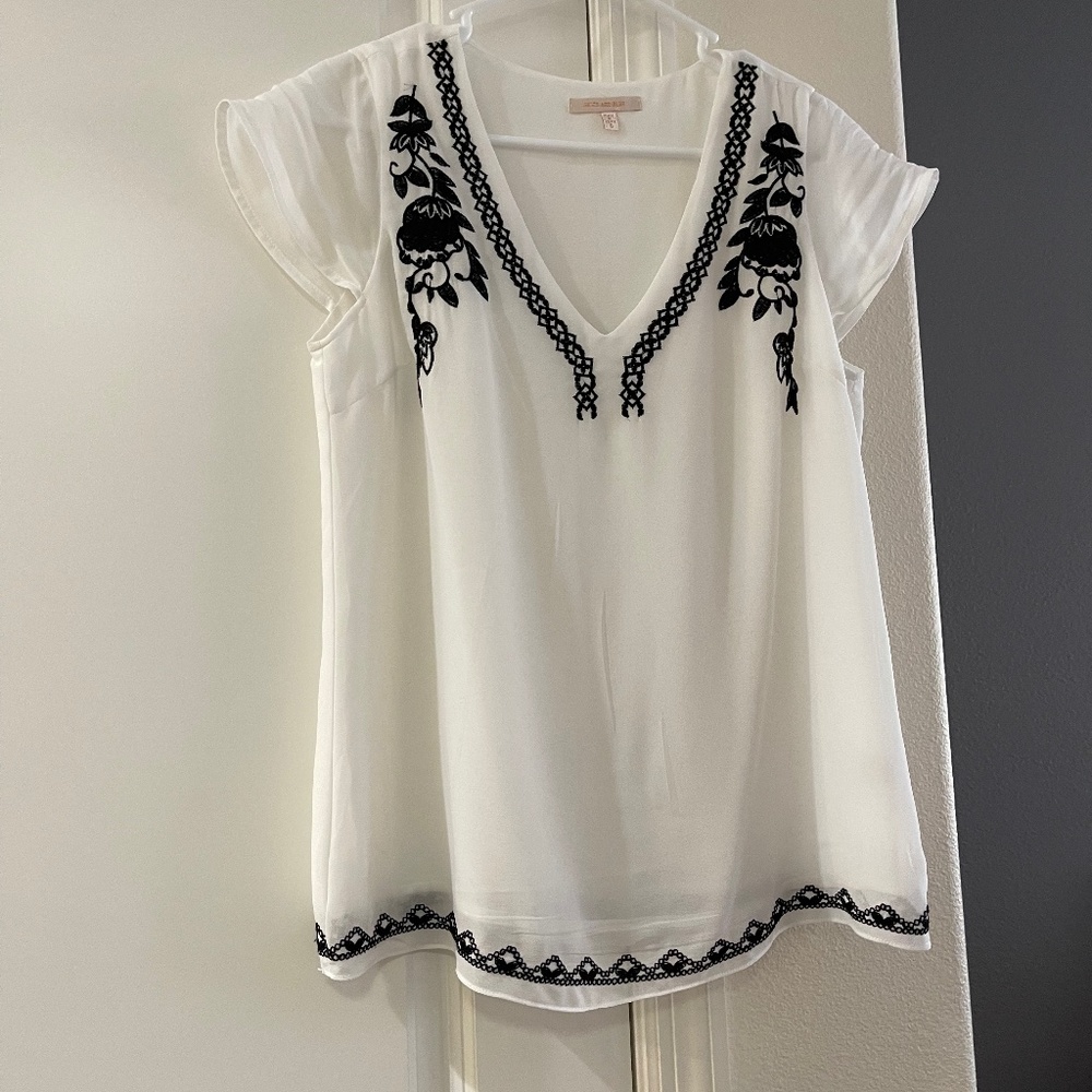 White and black blouse